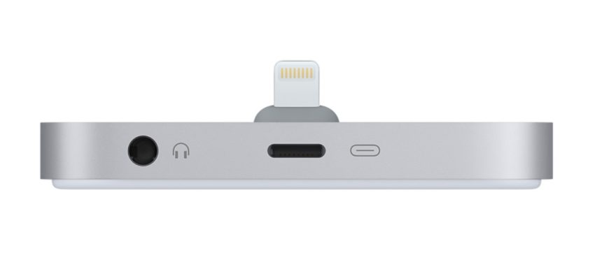 Use la base para escuchar música en un escritorio mientras carga el iPhone 8.