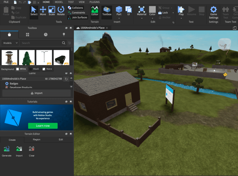 Roblox Studio Editor mostrando una aldea prefabricada