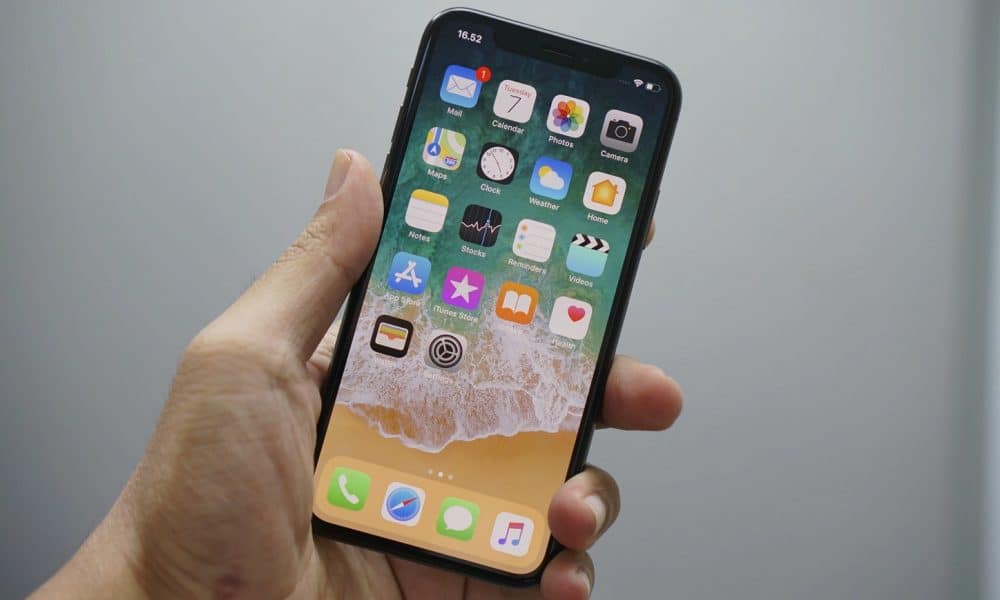 apple iphone with ios 13 apps on screen