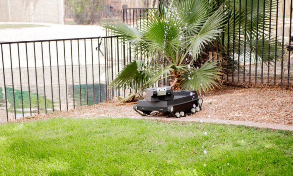 yardroid landscaping robot spraying water